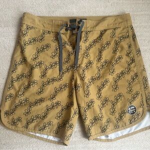 Stylish Men's Floral Board Shorts in Mustard